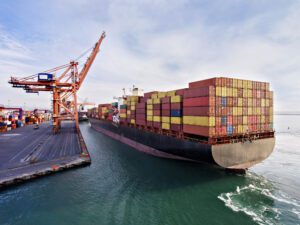 Aerial view of cargo ship in transit.